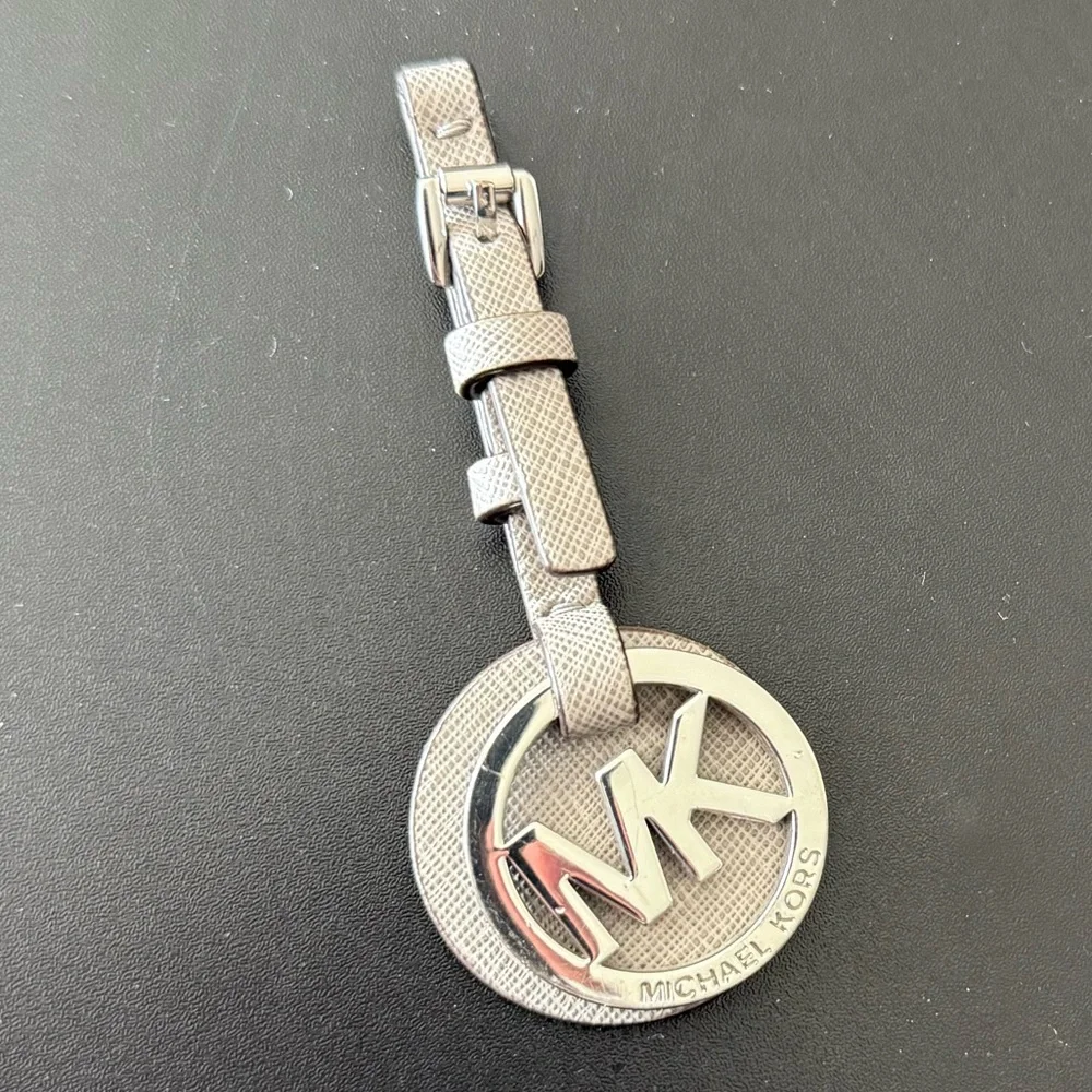 Michael Kors Silver MK Circle Logo Tag with Taupe Textured Strap
